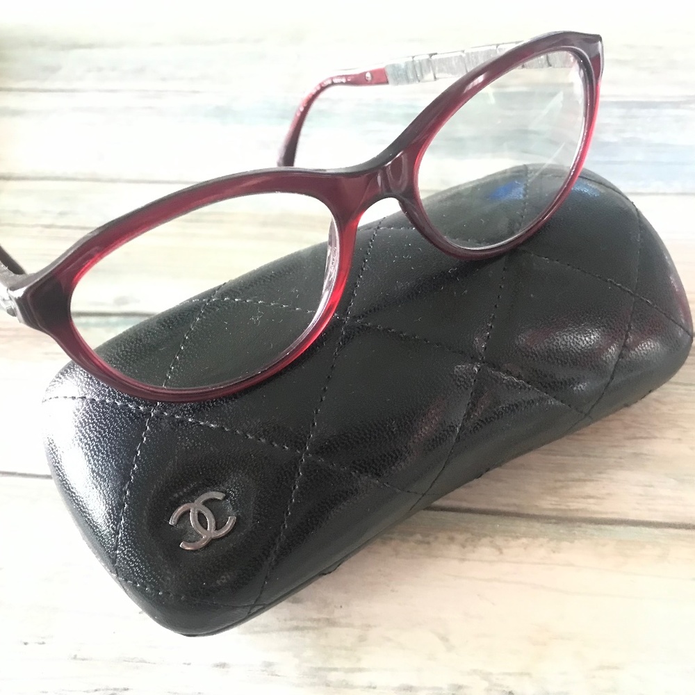 CHANEL Cat’s Eye frames with crystal accents.